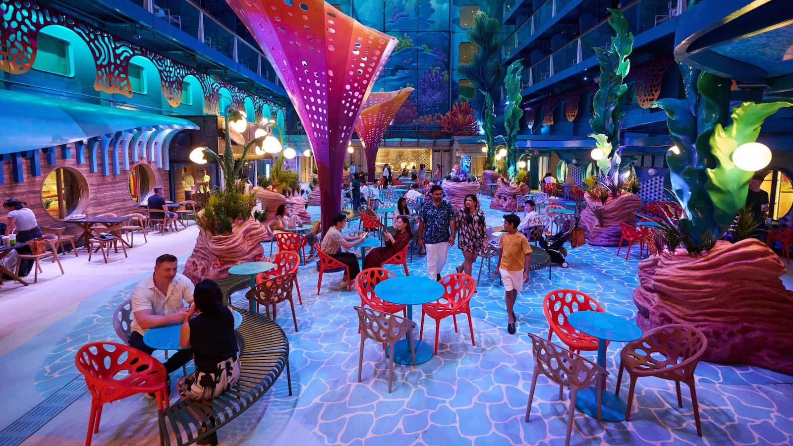 Discovery Reef dining and gathering area on the Disney Adventure cruise ship inspired by The Little Mermaid and Finding Nemo