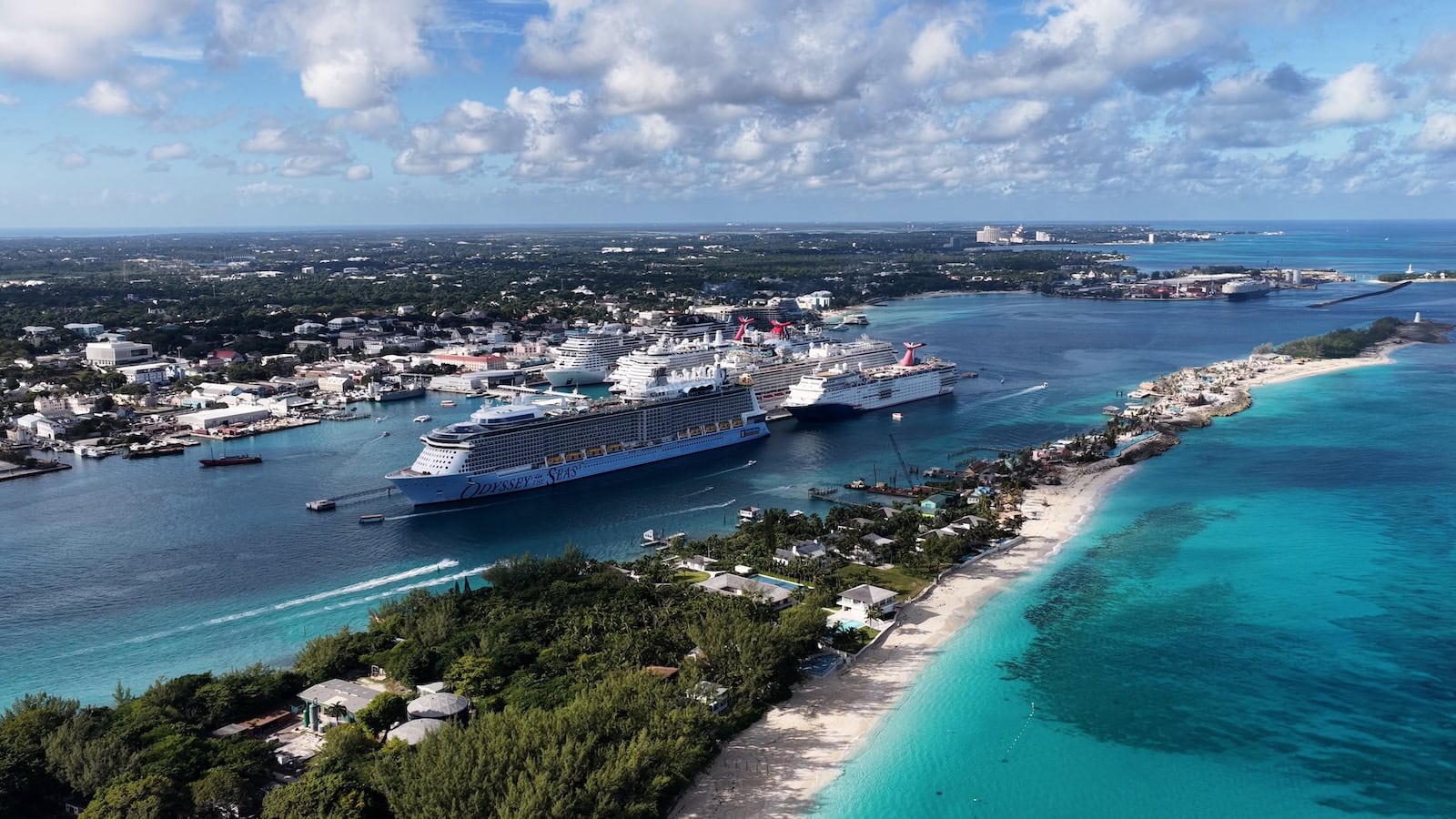 Cruise ships docked in Nassau with turquoise harbor water