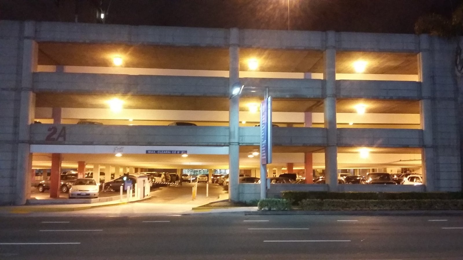 Cars parked in a multi level airport parking garage at LAX