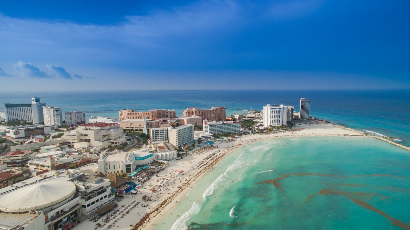 Aerial view of the Cancun hotel zone beach and turquoise Caribbean water in Mexico