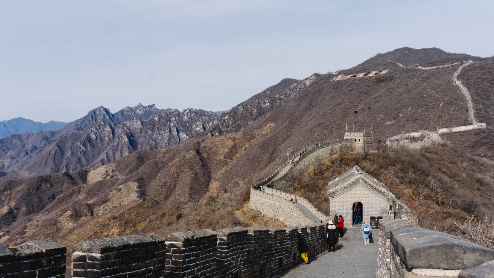The Mutianyu section of the Great Wall of China winding over forested mountains near Beijing