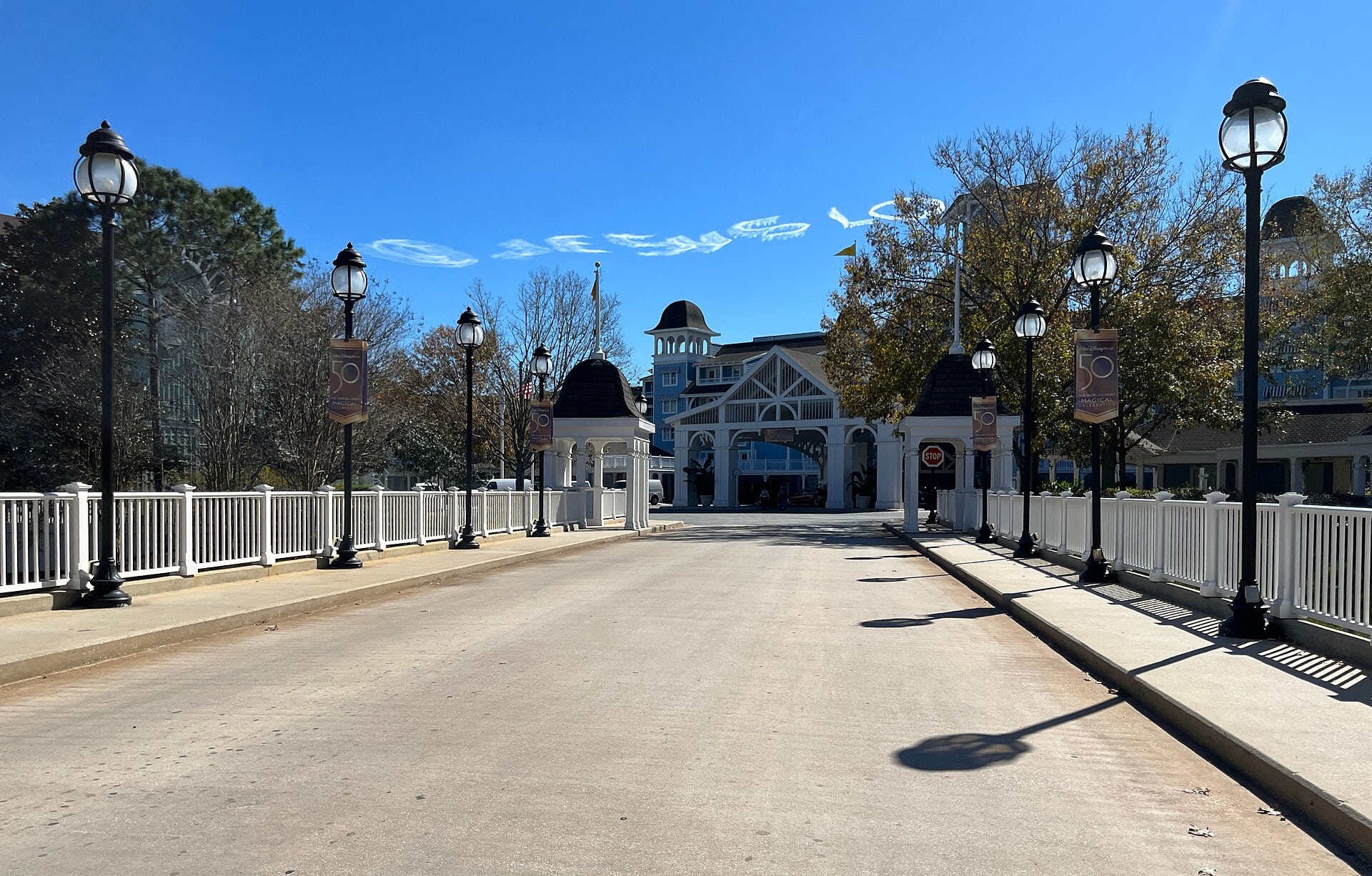 The pastel exterior and main entrance of Disney's Beach Club Resort