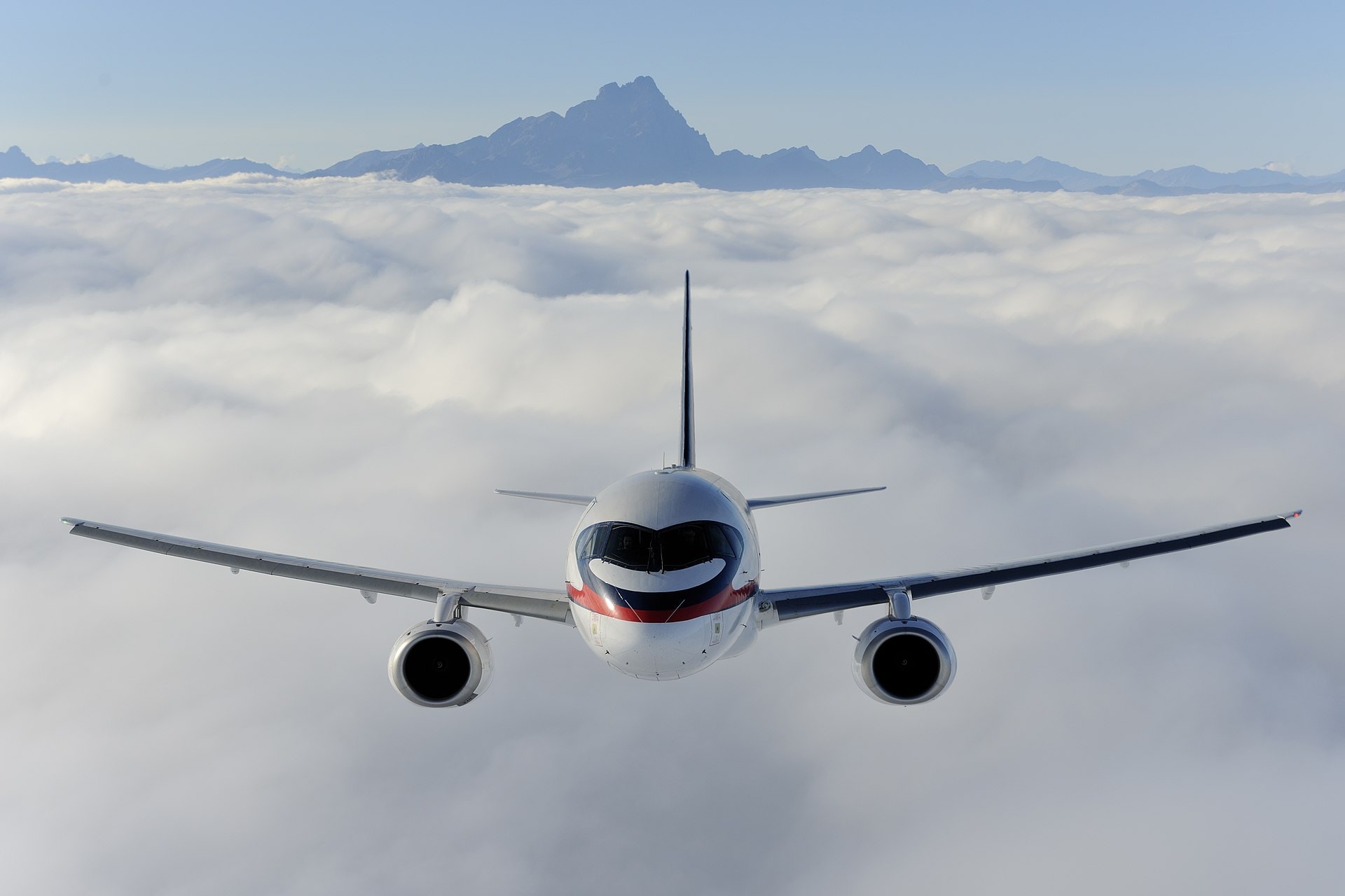 Travelers planning an airline itinerary before departure