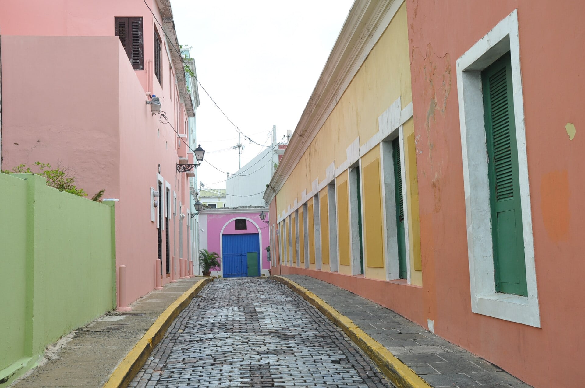 Colorful colonial era houses and a cobblestone street in Old San Juan, Puerto Rico