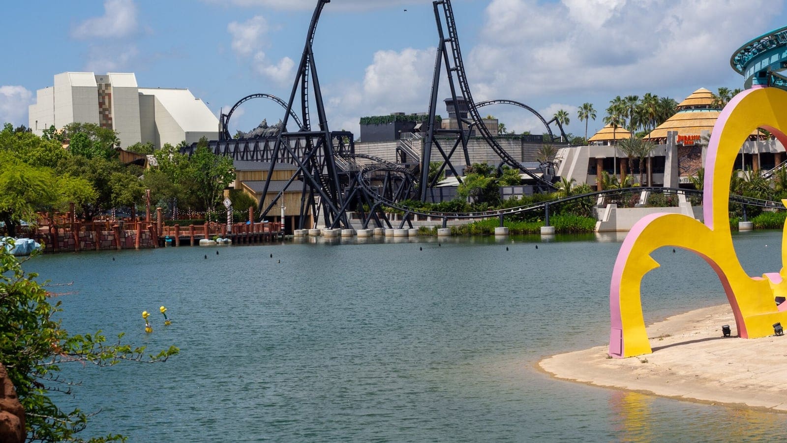 The high speed launched steel roller coaster Jurassic World VelociCoaster looping through the prehistoric landscape of Universal's Islands of Adventure.