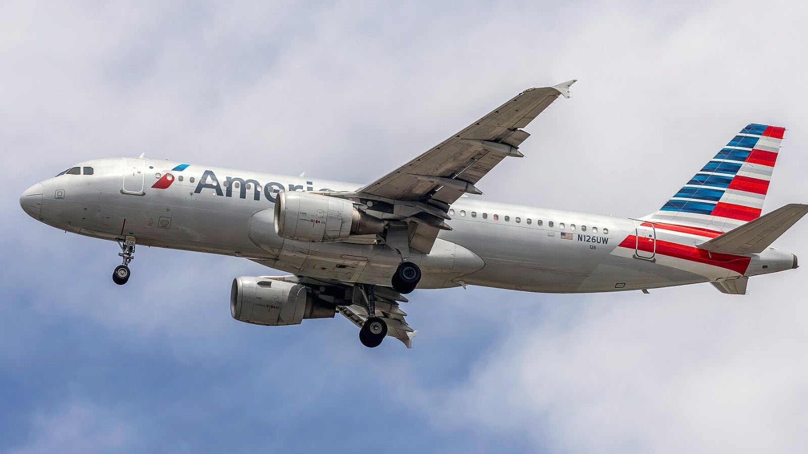 An American Airlines Airbus A320 jet on the ground at the airport.