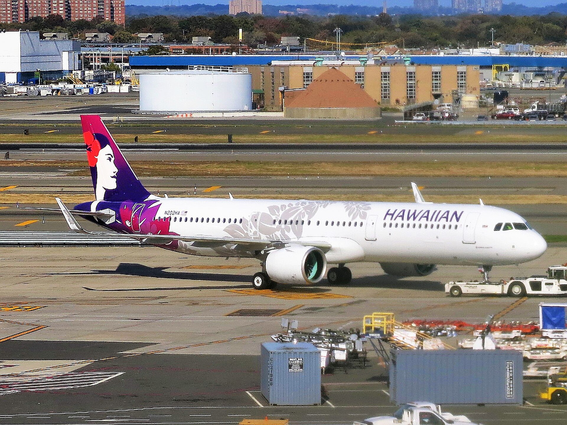 A Hawaiian Airlines narrowbody Airbus A321neo passenger plane parked on the tarmac at the airport