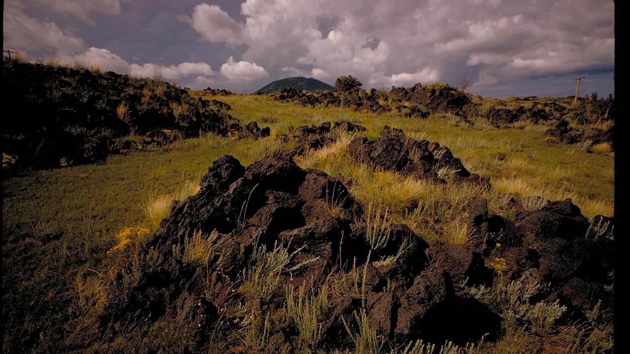 Cone over grassland