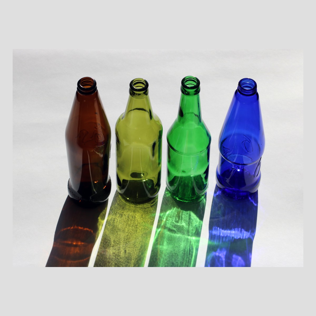 Cans of beer on white background