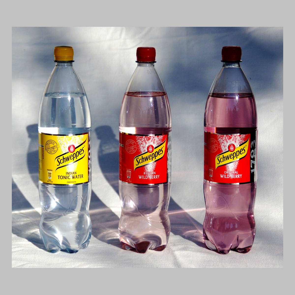 Cans of tonic and soda mixers