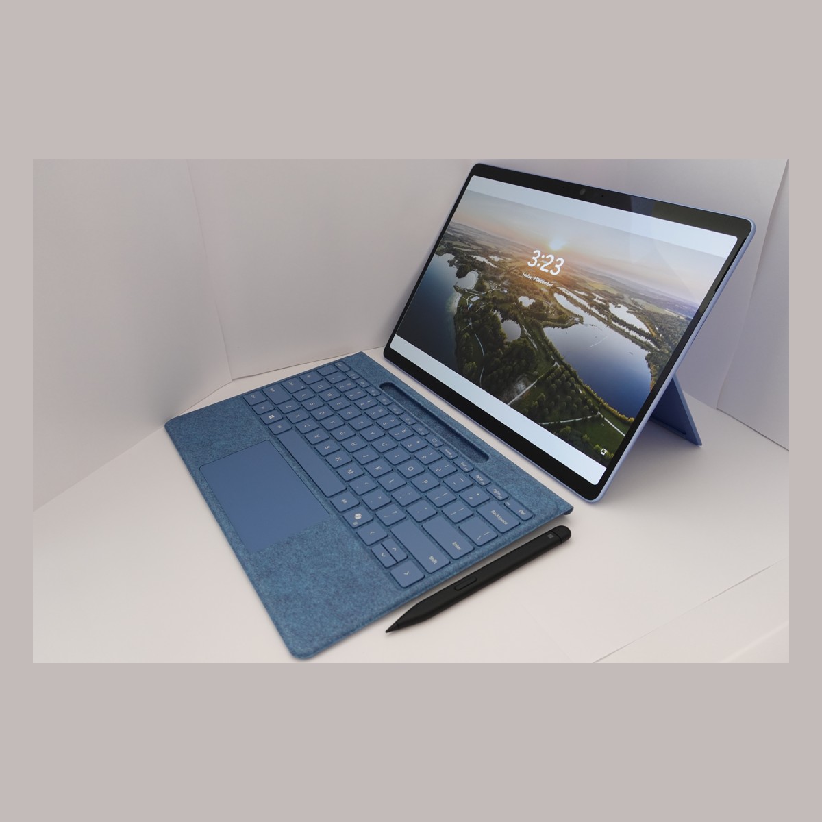 Laptop beside a cruise cabin key card