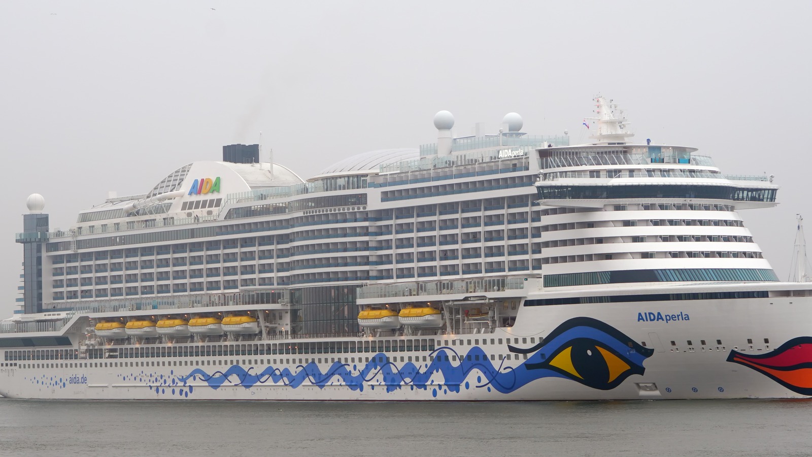 AIDAperla cruise ship with AIDA logo and signature bow eye artwork on the hull