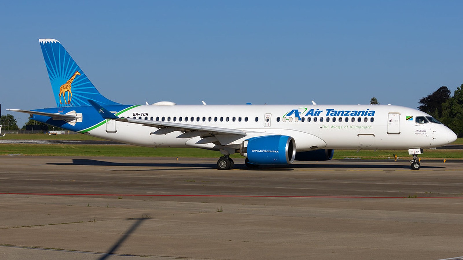 Air Tanzania Airbus A220-300 registration 5H-TCH on the taxiway under clear blue sky