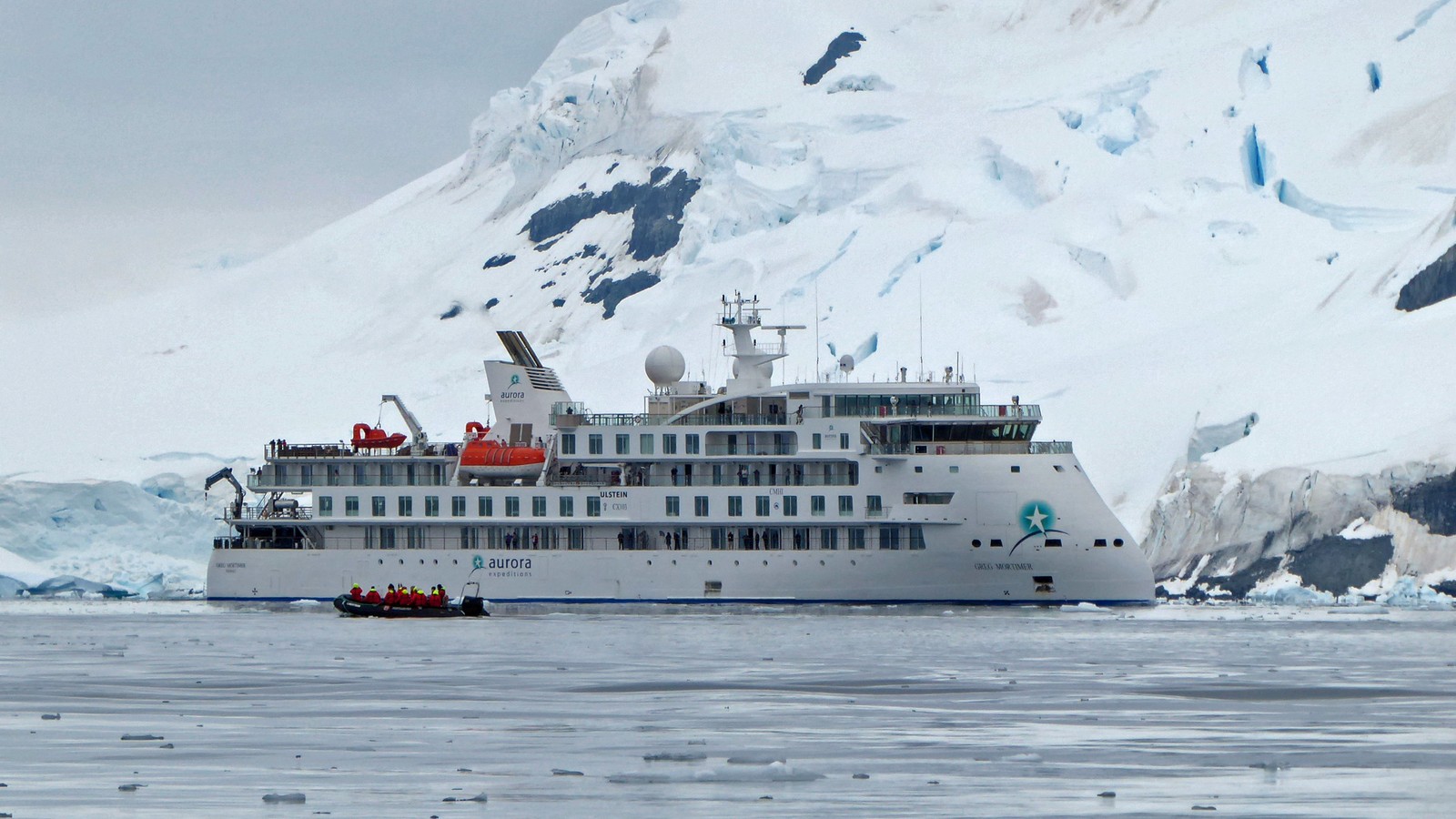 Aurora Expeditions Greg Mortimer expedition ship sailing in Antarctic waters