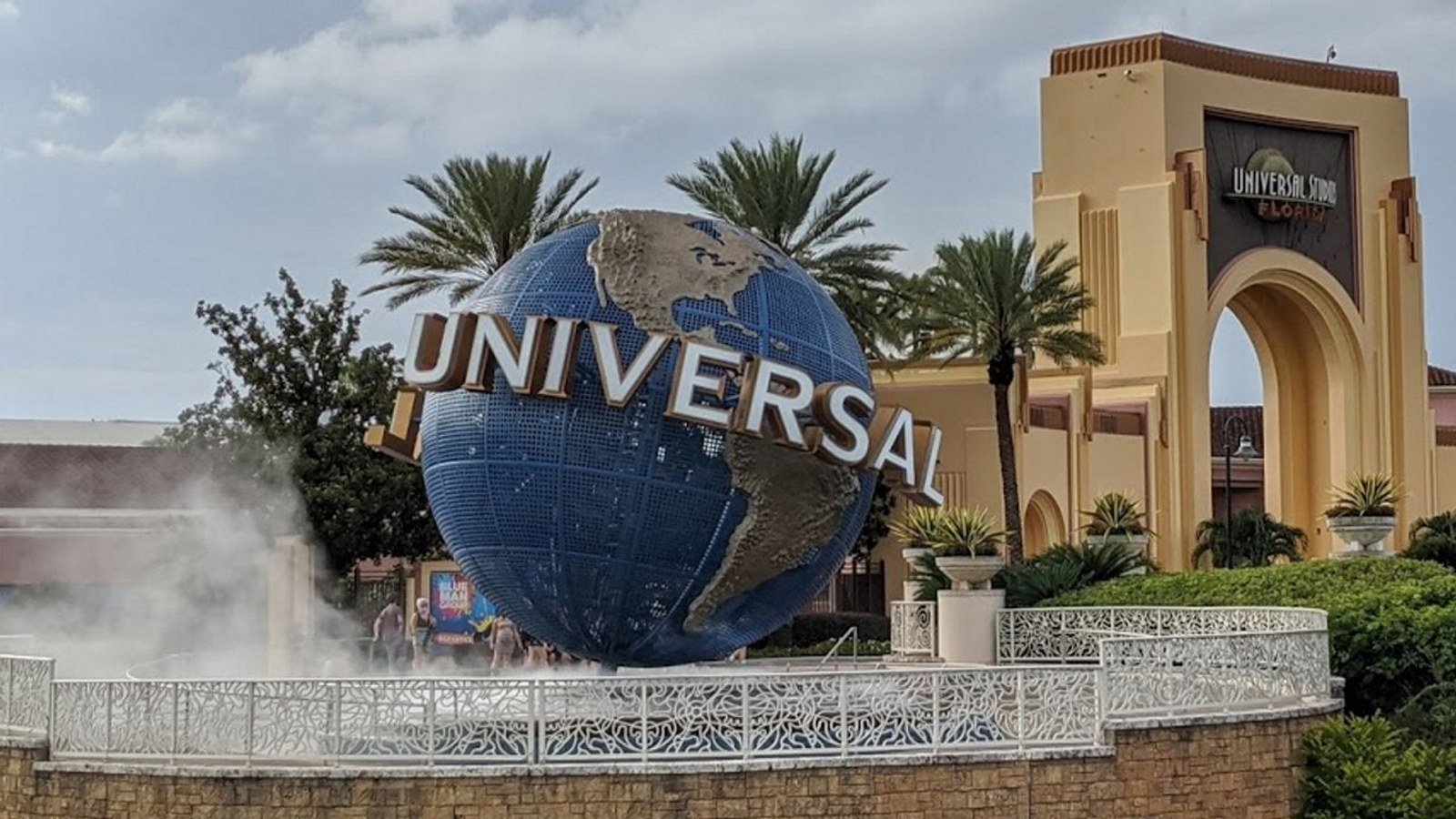 Universal Orlando globe with mist near the park entrance