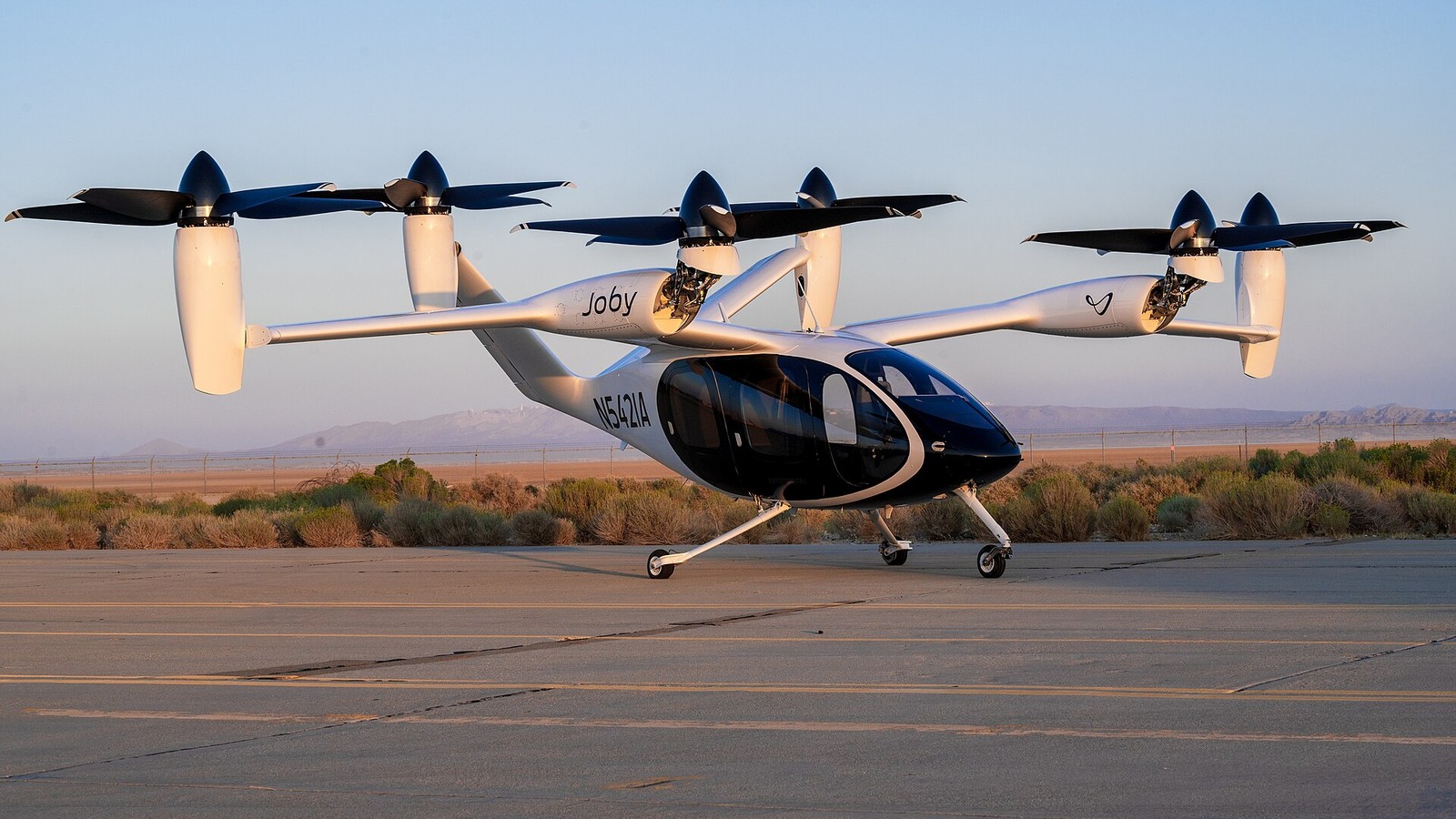 Joby Aviation S4 experimental electric vertical takeoff aircraft on a flight line