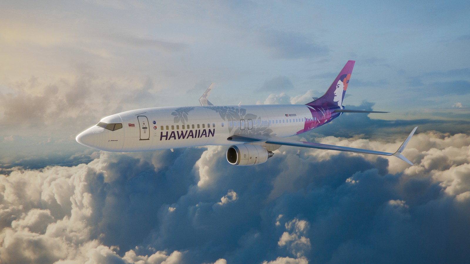 Hawaiian Airlines Boeing 737 aircraft flying at sunrise over water