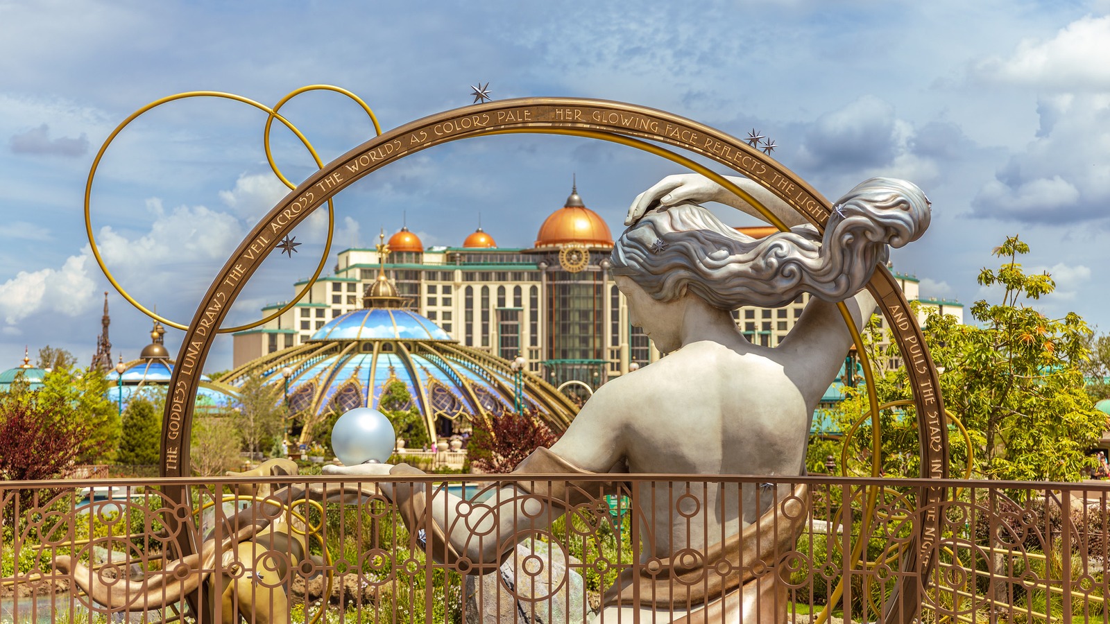 Celestial Park goddess statue and Helios Grand Hotel domes at Universal Epic Universe