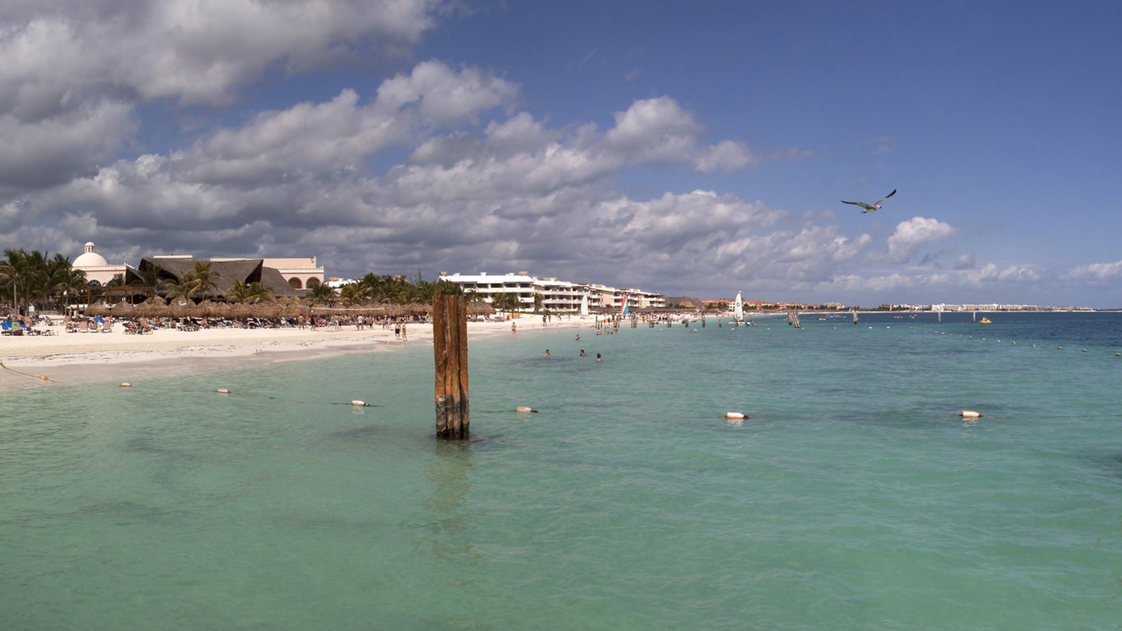 Cancun hotel beach with turquoise Caribbean water and white sand shoreline