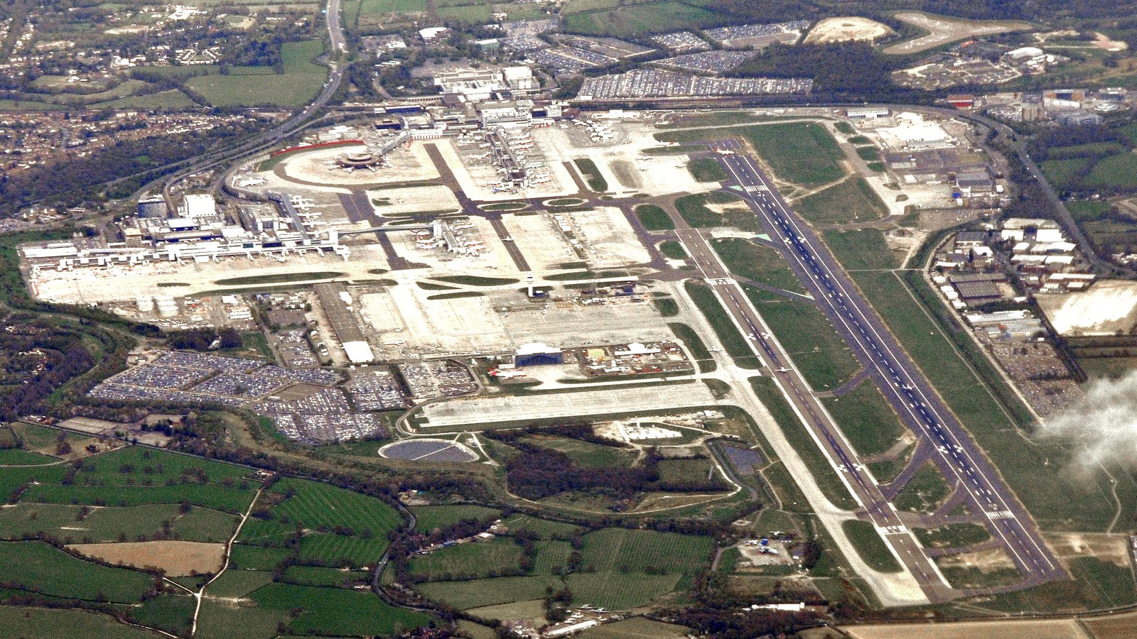 Exterior view of London Gatwick Airport buildings and aircraft stands