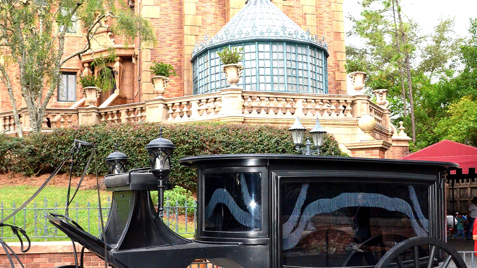 Haunted Mansion exterior facade at Magic Kingdom Walt Disney World under daylight sky