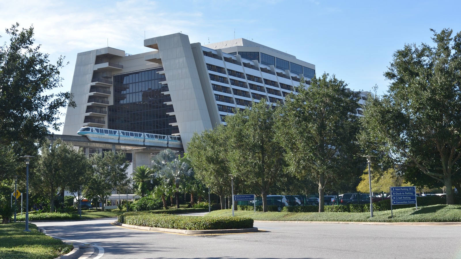 Disney Contemporary Resort exterior with Monorail Teal arriving at the hotel