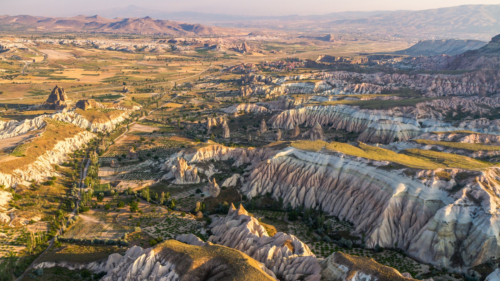 Aerial view of Cappadocia rock landscape under bright daylight