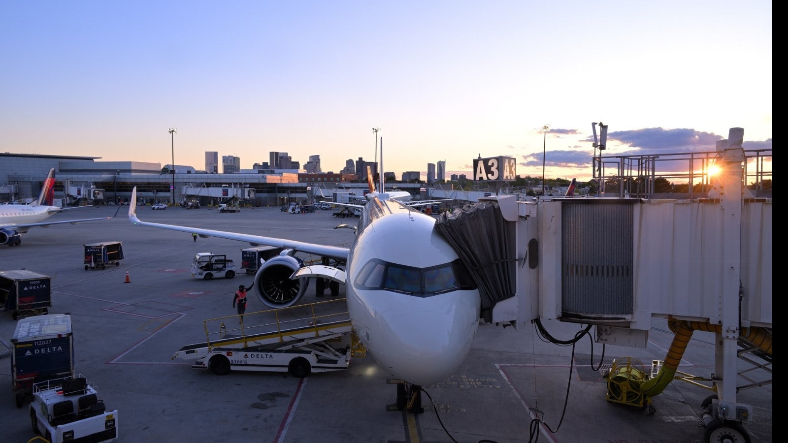 Delta Air Lines Airbus A321neo jet at an airport gate