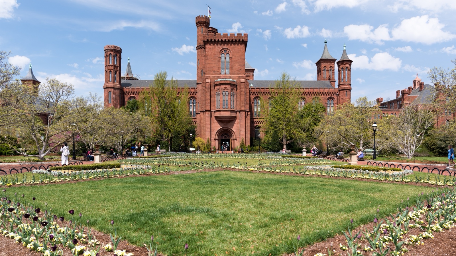 Smithsonian Castle and its red sandstone towers viewed from the south lawn
