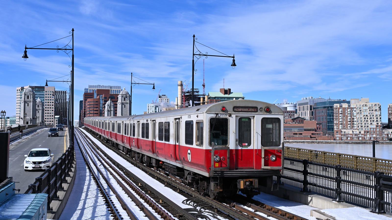 Outbound MBTA Red Line train crossing the Longfellow Bridge toward Boston