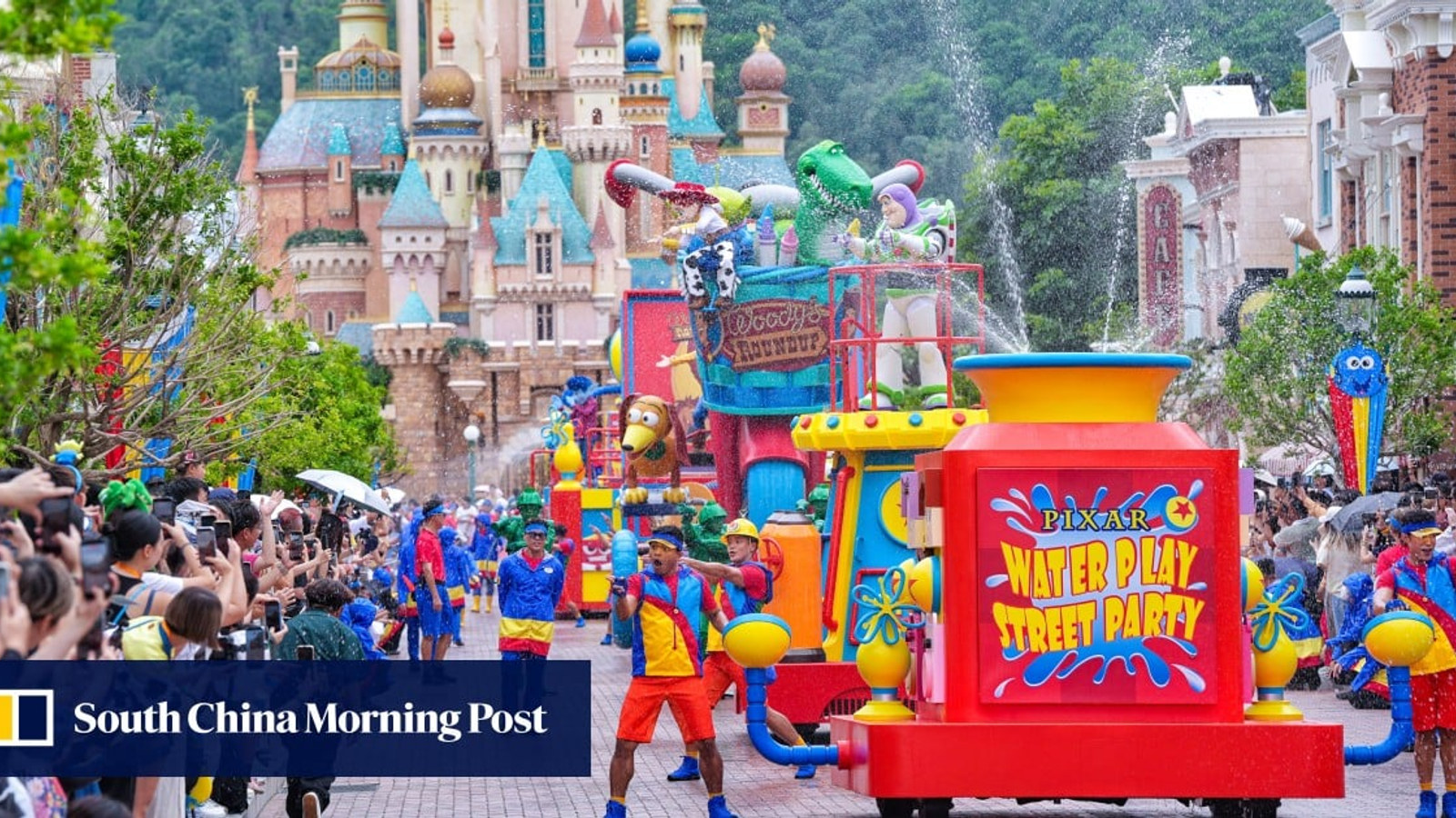 Performers and guests during a summer water party at Hong Kong Disneyland