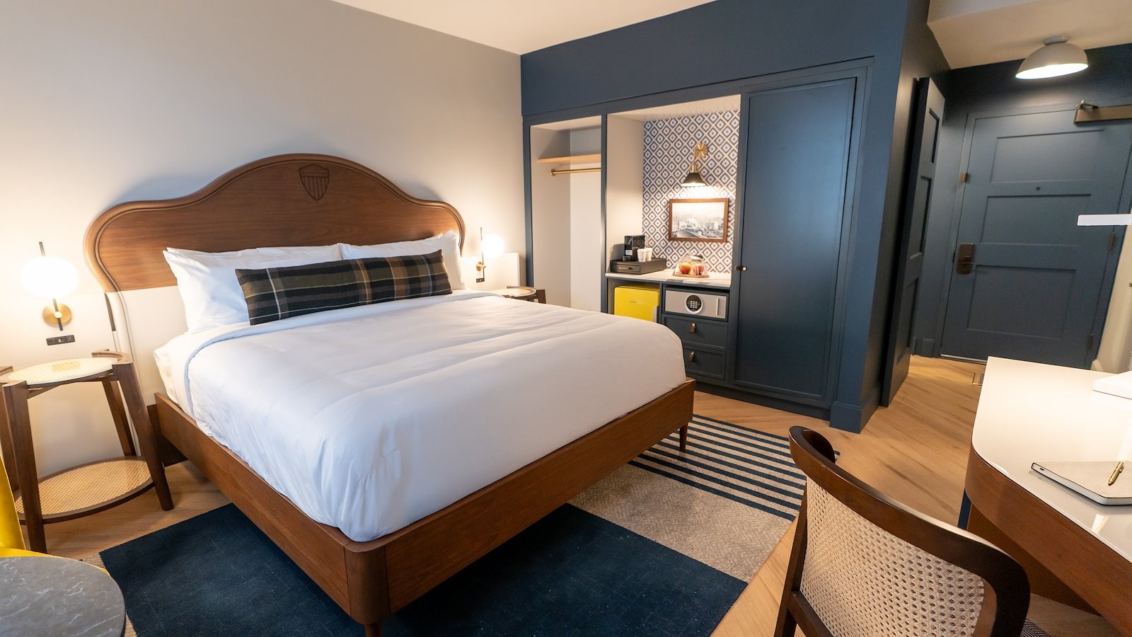 Guest room at The Hoya Hotel at Georgetown with king bed and branded headboard