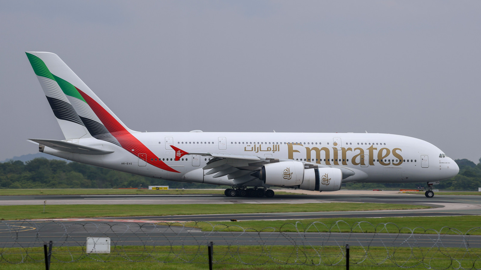 Emirates Airbus A380 registration A6-EVG in flight near Manchester Airport