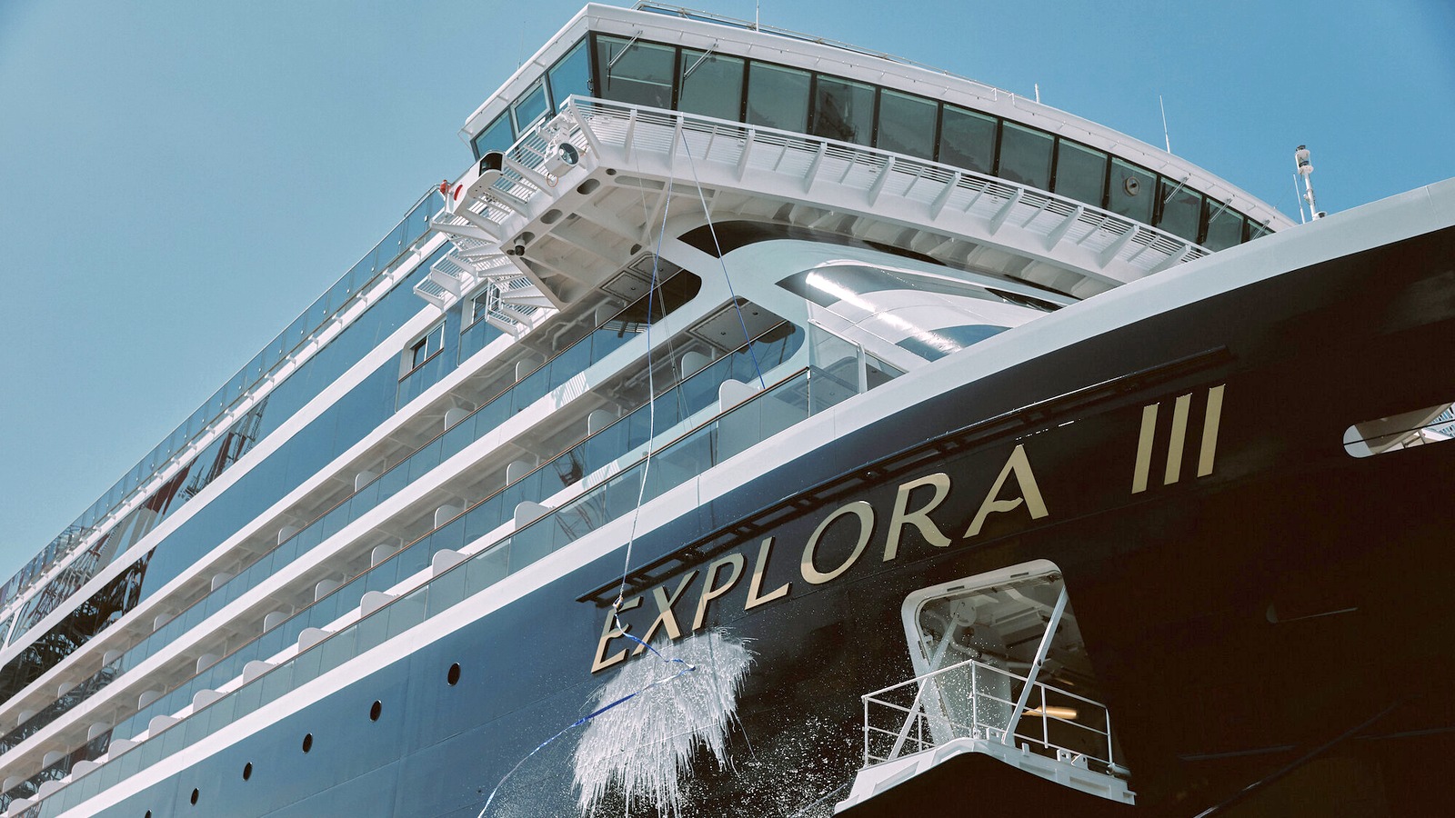 EXPLORA III hull name and bottle-breaking splash at delivery ceremony