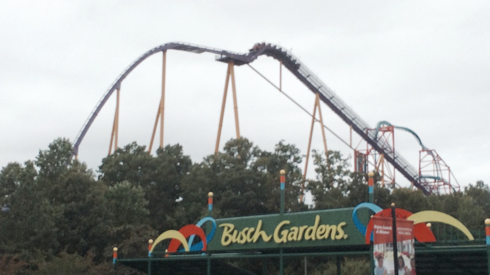 Busch Gardens Williamsburg entrance sign with Apollo's Chariot roller coaster overhead