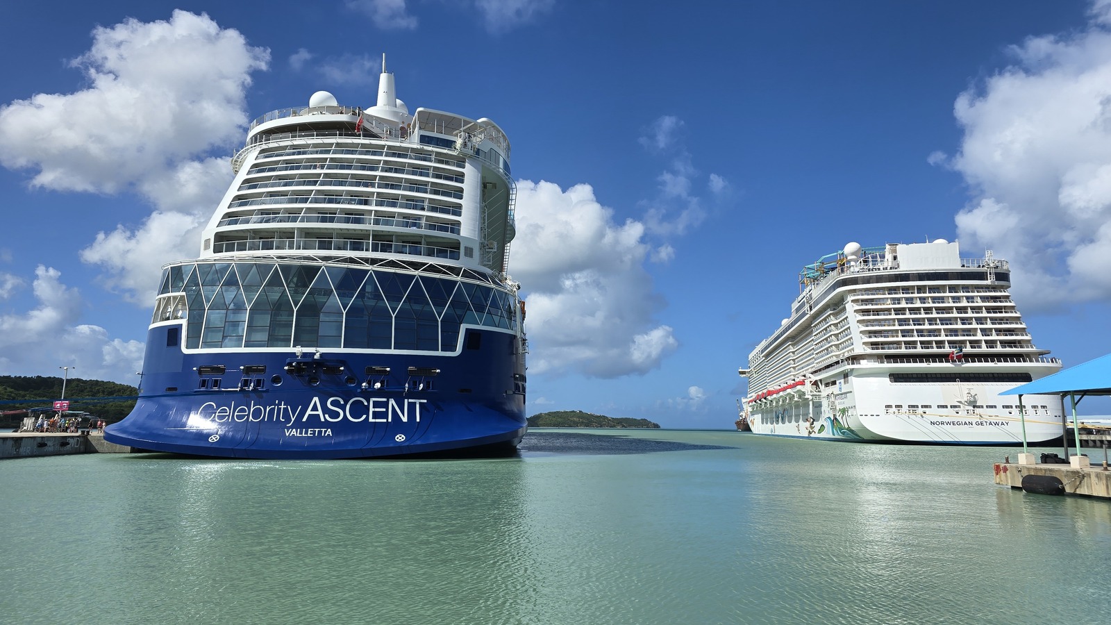 Celebrity Ascent cruise ship bow with readable ASCENT hull lettering at St. Johns harbor