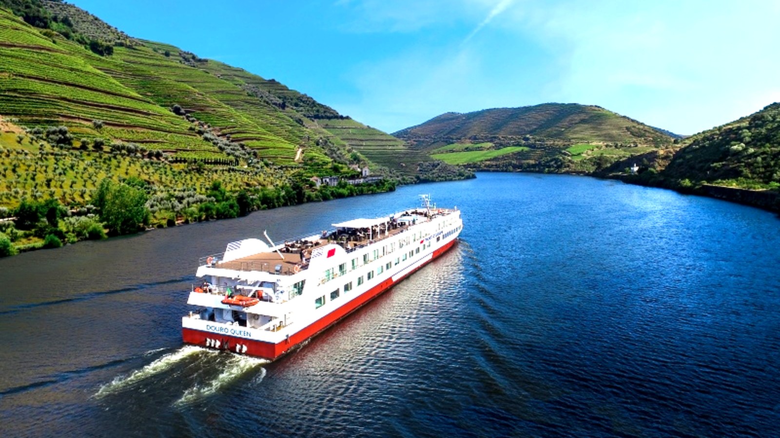 Douro Queen river ship sailing the Douro River past terraced vineyards