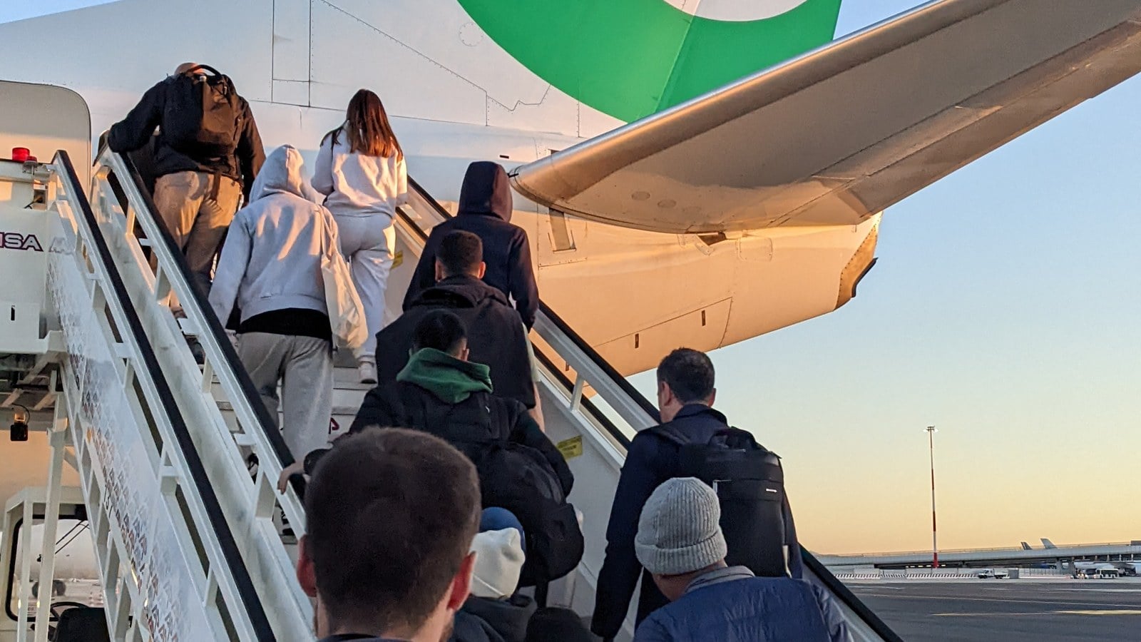 Passengers boarding an aircraft at Rome Fiumicino Airport