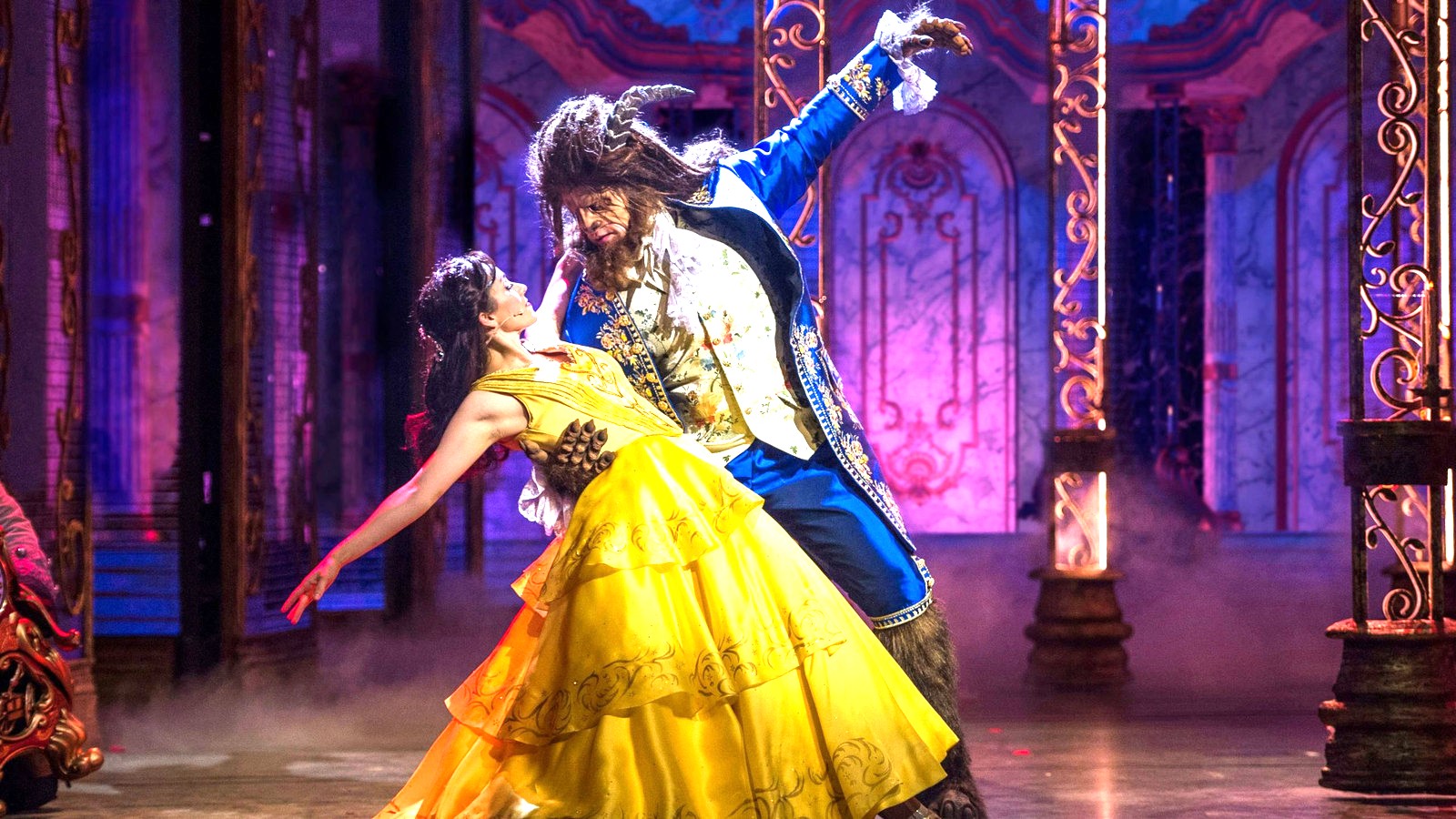 Belle and the Beast in the Beauty and the Beast stage show on the Disney Treasure