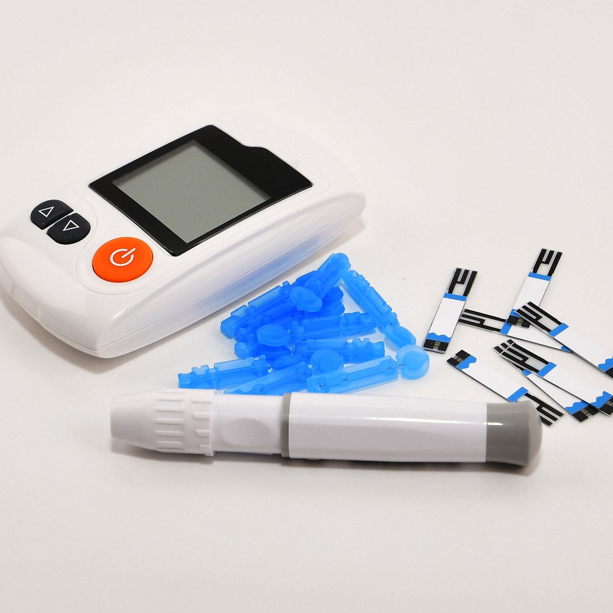 Blood glucose meter with test strips and lancets