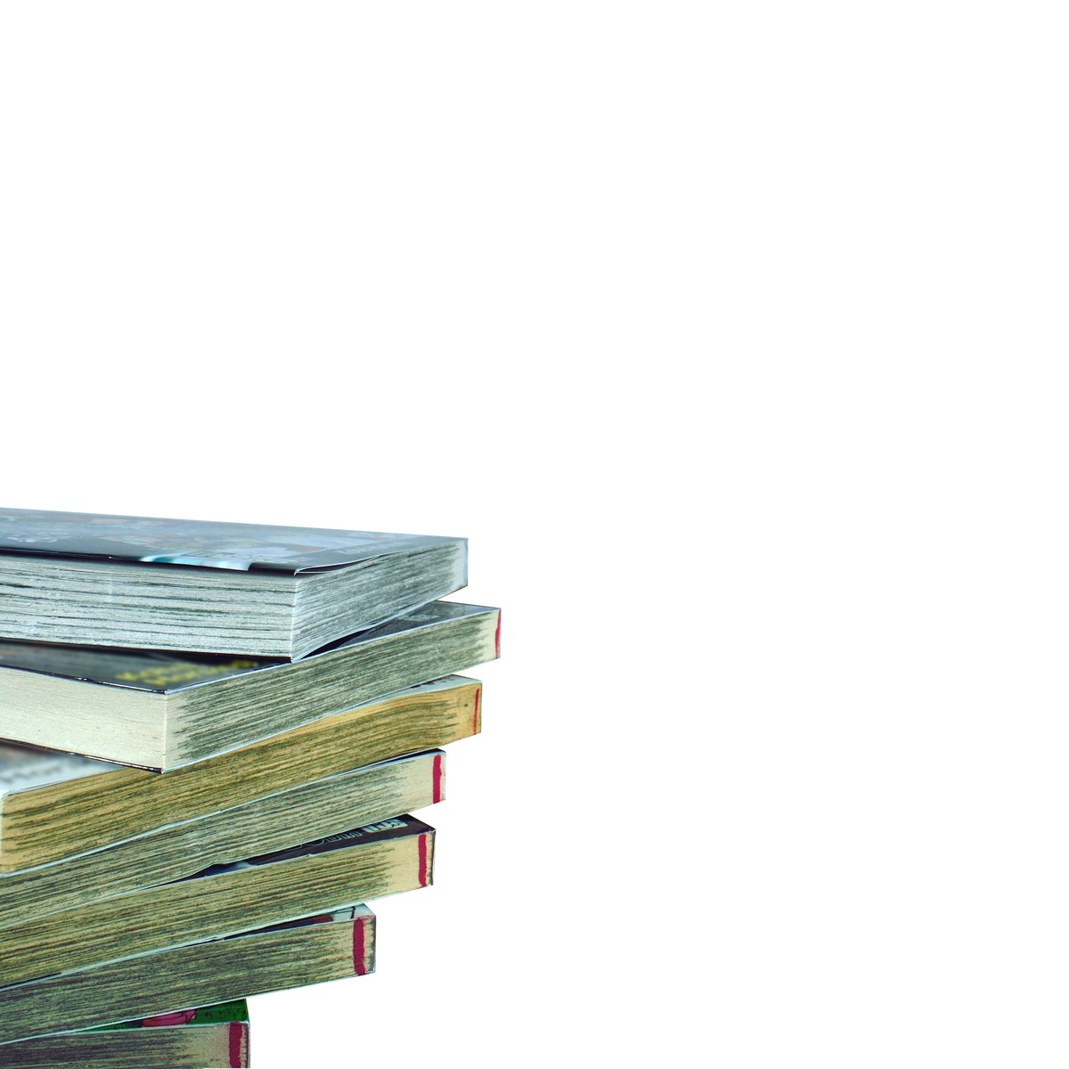 Stack of comic books with colorful page edges