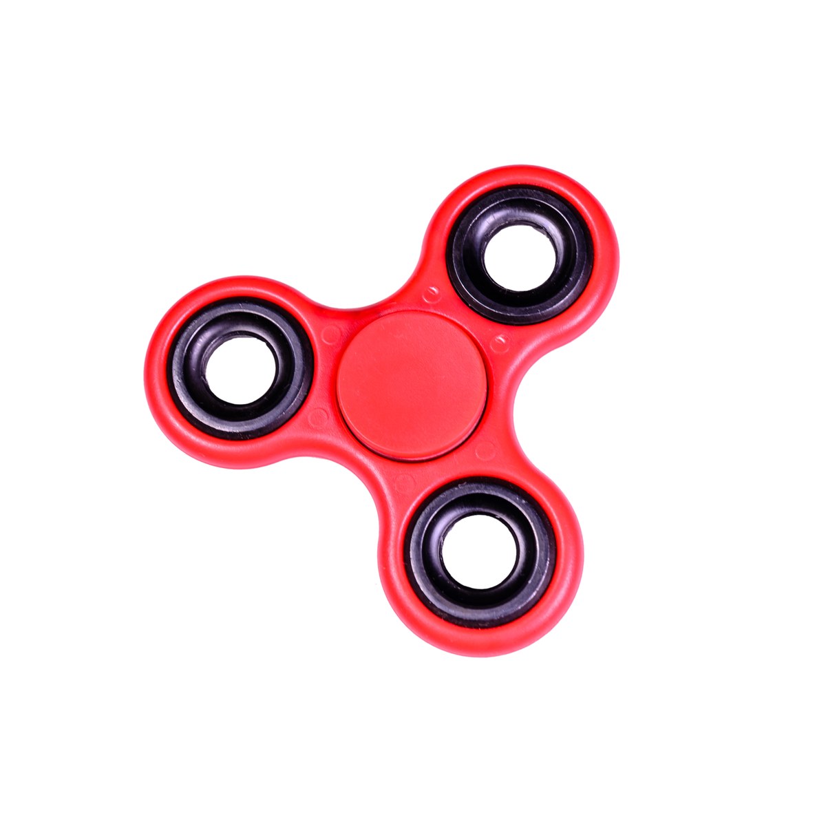 Red fidget spinner on a white background