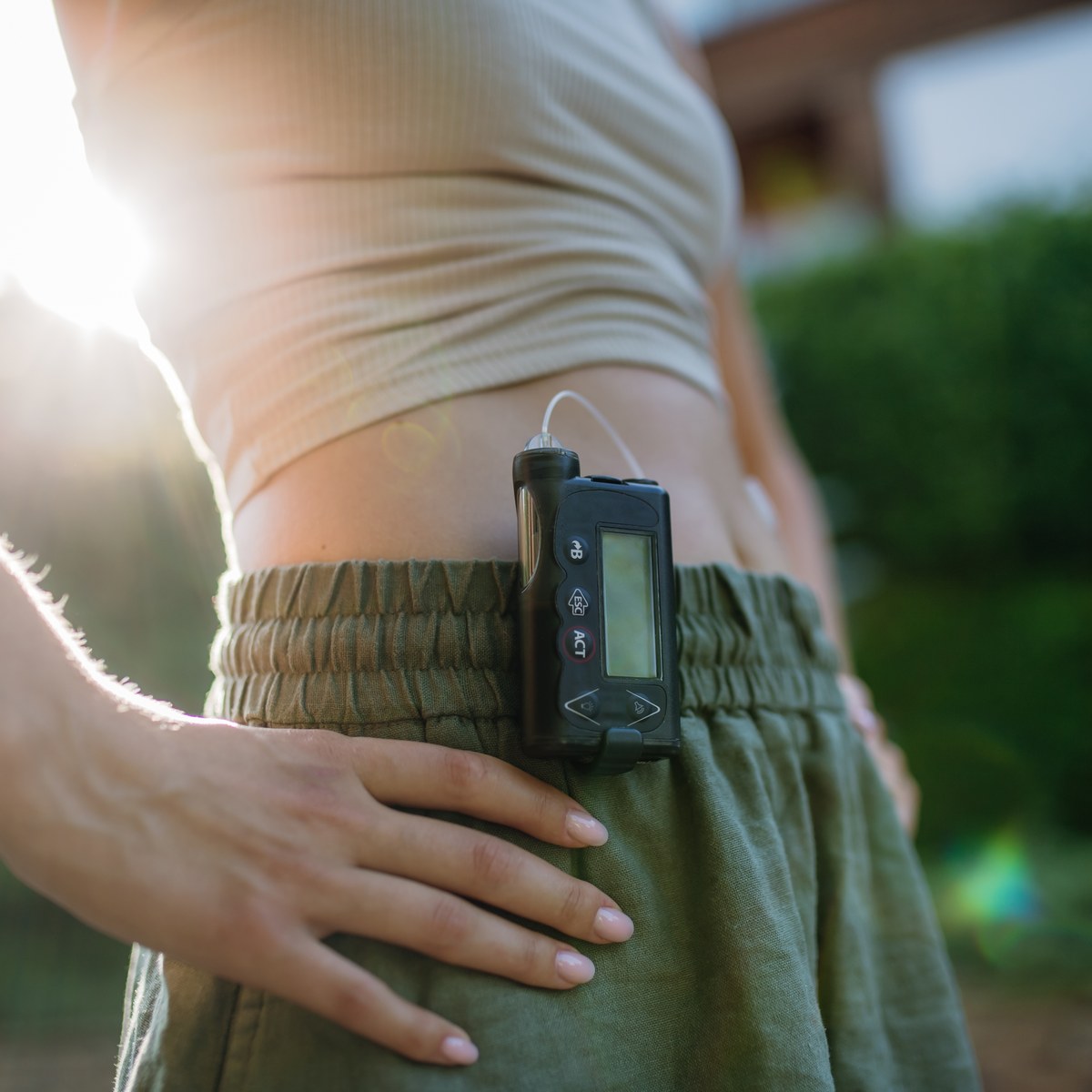 Insulin pump clipped to a waistband
