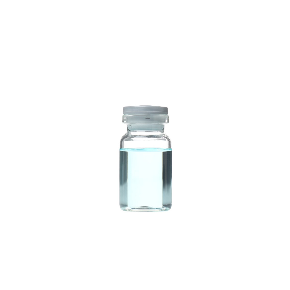 Bottle of liquid medication with a dosing cup