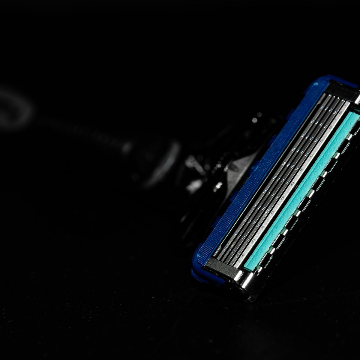 Black cartridge razor on a dark background