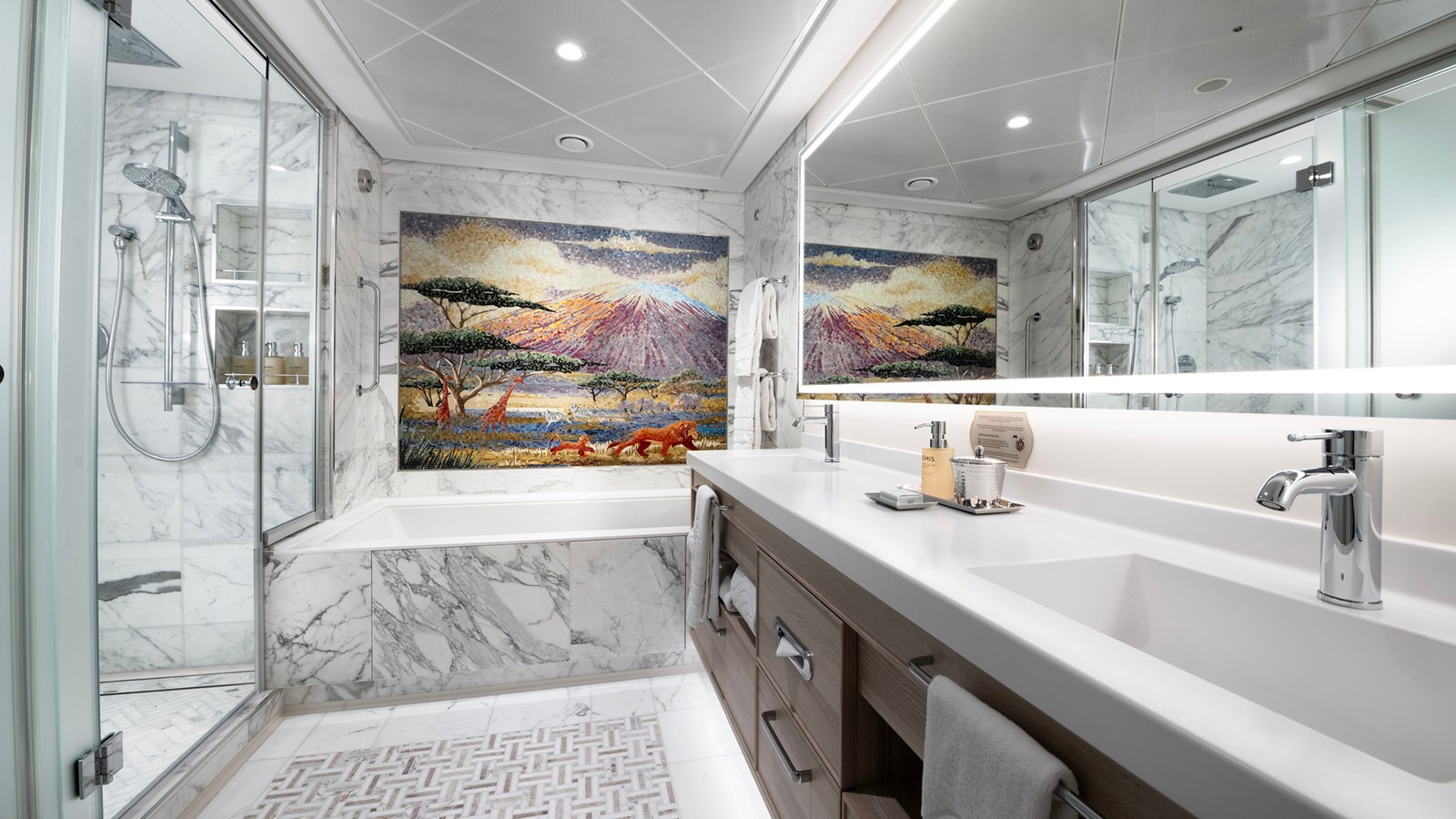 Concierge stateroom bathroom with a double vanity on the Disney Treasure