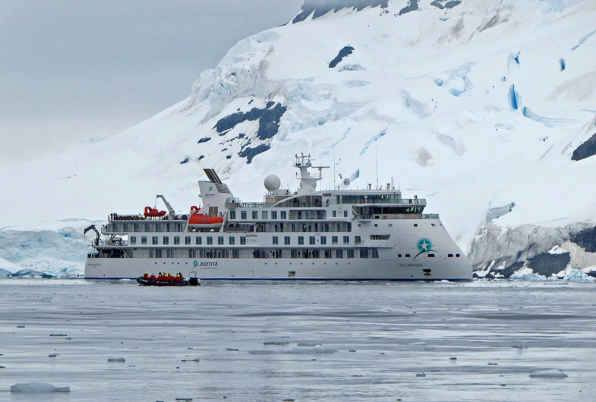 The Aurora Expeditions ship Greg Mortimer in the icy polar waters of Antarctica.
