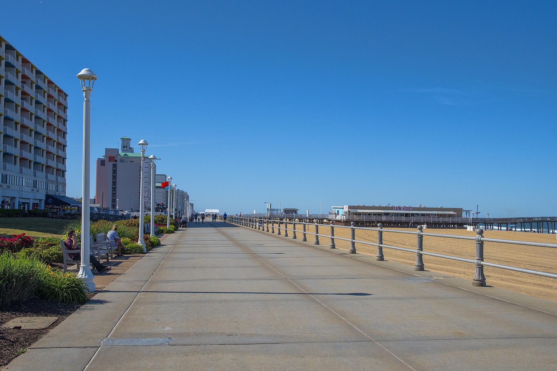 A beautiful wide angle shot of the beach and boardwalk walkways in Virginia Beach.