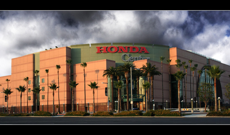 Honda Center exterior in Anaheim beneath a dramatic sky