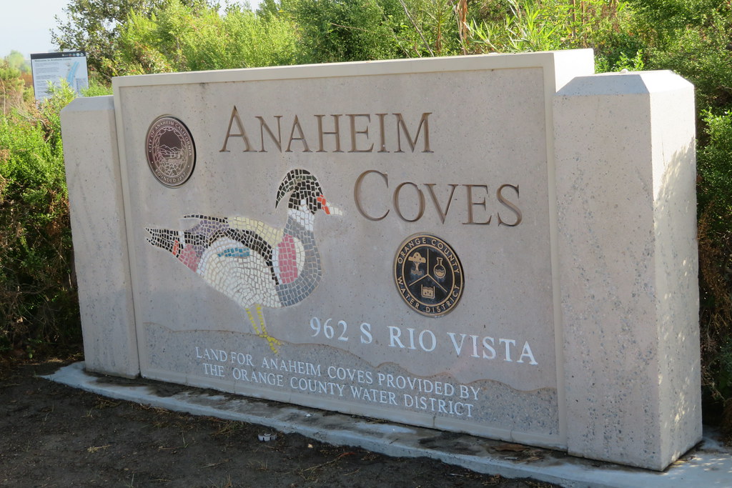 Anaheim Coves entrance marker beside the regional trail